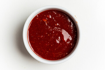 bbq sauce in the white bowl