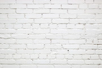 Obraz premium Texture of white wall made of old bricks. Surface background with copy space.
