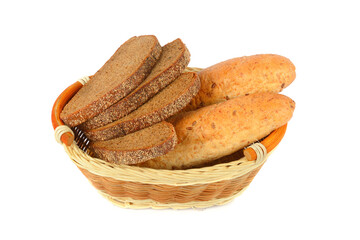 bread in wicker basket isolated on white