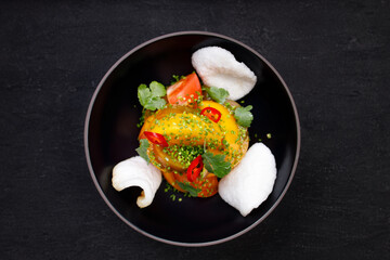 Salad of various tomatoes, healthy vegan food