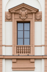  Windows in the city in the old style, with stucco, decorative elements