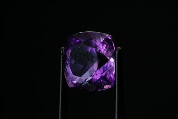 Natural stone amethyst on black background
