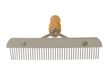 Stainless steel comb with wooden handle for combing pet hair. Isolated on a white background.