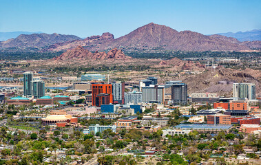 Aerial view of a Growing Tempe, Arizona Skyline with Camelback Mountain in the distance
