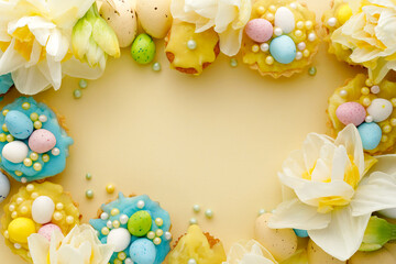 Easter pastel background with decorations and spring flowers and place for text