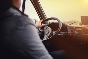 truck driver rides driving a car