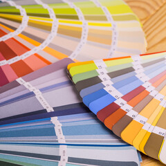 Close-up on color palette guide for printing and painting. Concept - choice of colors for design.