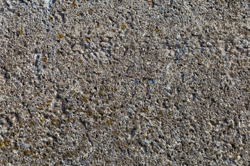 Pattern of stone wall surface. Texture of a stone wall.  Stone wall as a background or texture. Part of a stone wall, for background or texture