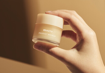 Hand Holding Cosmetic Product Mockup