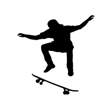Silhouette teenage boy skateboarder jumping