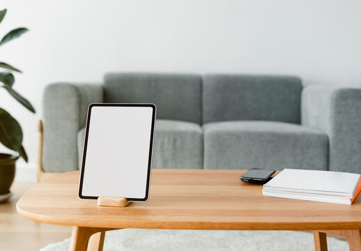 Tablet Screen Mockup on Wooden Table