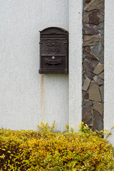 street metal letter box for newspapers and correspondence on the wall