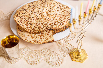 Matzah on the table for the Passover Seder symbols of Judaism.