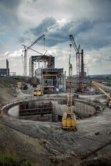 Rudny, Kostanay region, Kazakhstan-May 28 2012: Sokolovo-Sarbay Mining and processing plant. Construction of new industrial building and well.