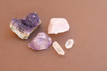 Healing crystals on brown background