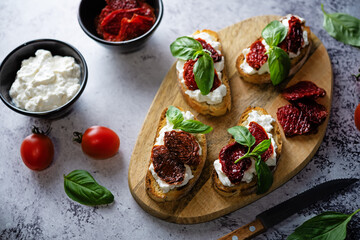 Ricotta dried tomato Basil bruschetta