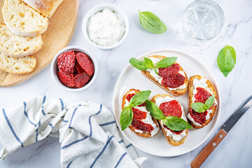 Ricotta dried tomato Basil bruschetta