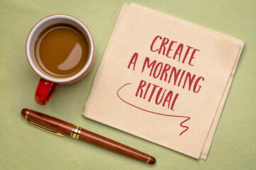 create a morning ritual - inspirational handwriting on a napkin with a cup of coffee, lifestyle and...