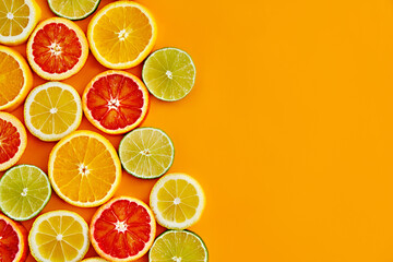 Orange bright background with citrus slices