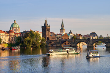 Fototapeta na wymiar Charles bridge crossing Vltava river in Prague, Czech Republic