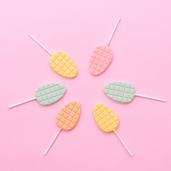 Minimalism concept of pops on pink backgraund. Space for text. Flat lay. 