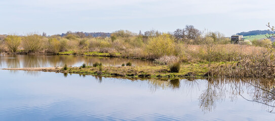 A view across a nature reserve on the outskirts of Nottingham, UK on a sunny spring day
