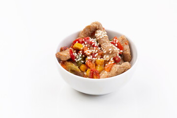 Meat with vegetables and sesame seeds 