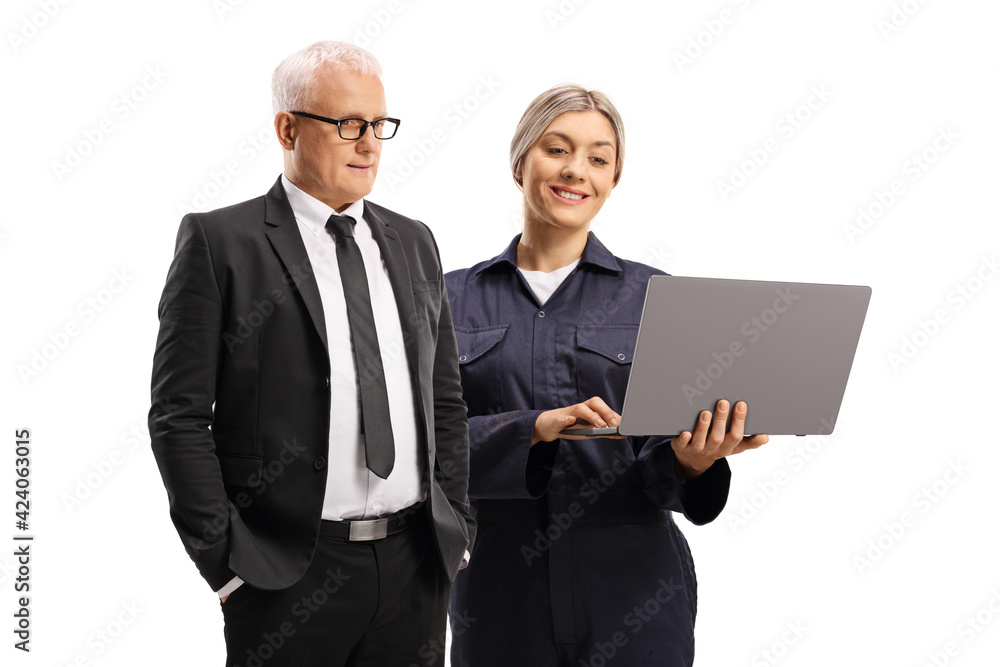 Poster auto repair female mechanic worker with a laptop computer and a mature man in a suit and tie