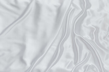 White smooth satin or silk texture background. Elegant cloth material textiles. White fabric abstract texture. Luxury satin velvet.