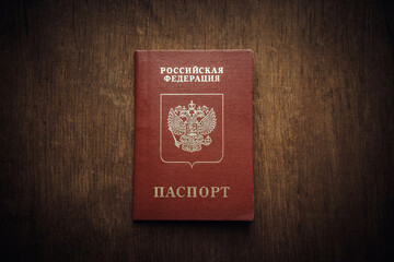 Foreign passport of the Russian Federation on a wooden table
