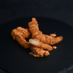 Tiger prawn Tempura with spicy sauce is a Japanese cuisine dish of seafood cooked in batter and...