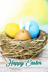  colored Easter eggs with bunny rabbit ears, selective focus image. Happy Easter card.