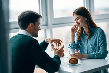 man and woman in a cafe communication dating breakfast