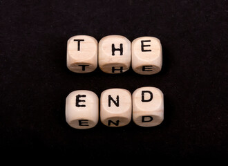 On wooden cubes the word end