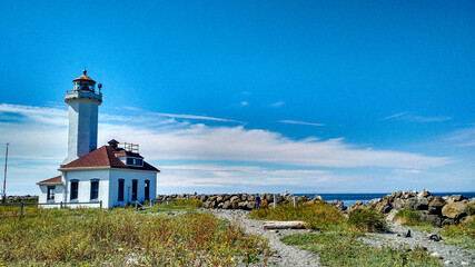 Fototapeta na wymiar Lighthouse on the coast