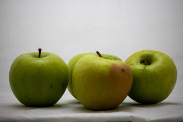 Group of green apples on a white background, Vitamin D, health food
