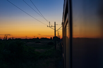 Zachód słońca z okna pociągu