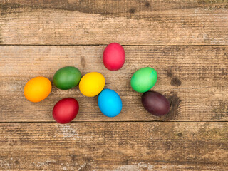 Easter eggs on a wooden background. The symbol of Easter.