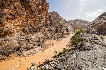 Orange River Moulouya (Oued) around Aouli mines near Midelt in Morocco after rain