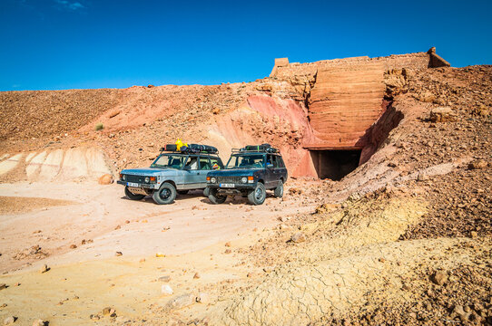 Aouli, Morocco - April 10, 2015. Two old Range Rover Classics in valley of mines near Midelt