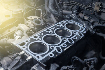 Short block with installed cylinder head gasket. Repair of a turbocharged diesel engine in a car...