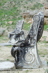 The theatre of the Amphiareion oropos Greece,Marble thrones with relief floral decoration