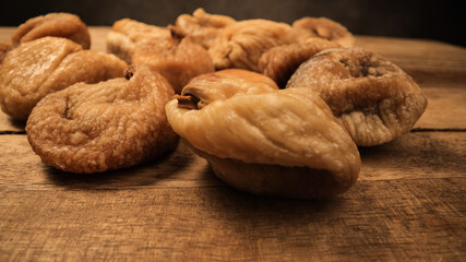 Dried figs on a wooden board - studio photography