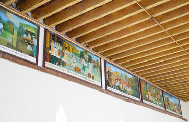 Paintings about daily life of Burmese on the wall of Ananda Pagoda hall way in Bagan, Myanmar