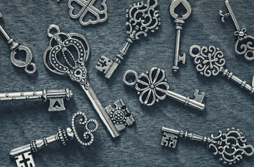 Vintage keys on gray wood background