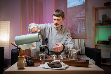 The master conducts online training in the chinese tea ceremony. Shows how to brew real tea correctly, according to ancient Eastern traditions.