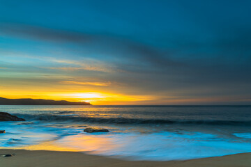 Obraz na płótnie Canvas High Cloud Sunrise Seascape with Soft Shades of Colour
