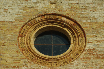 The rose window of the church of Santa Maria di Propezzano. Abruzzo - Italy
