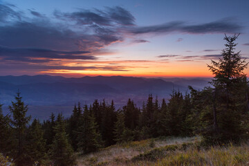 Naklejka na ściany i meble Very beautiful dawn in the Ukrainian Carpathian mountains in summer.