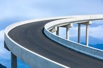 Asphalt road and mountain natural scenery.